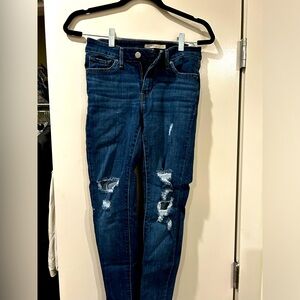 Ripped 711 Skinny Jeans